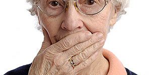 Ederly Woman Covering Mouth with her right hand