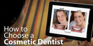 Dental Patient Looking at before and after photo of cosmetic dentistry procedure