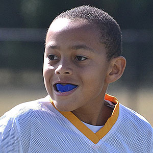 Kid Athlete Wearing Mouthguard