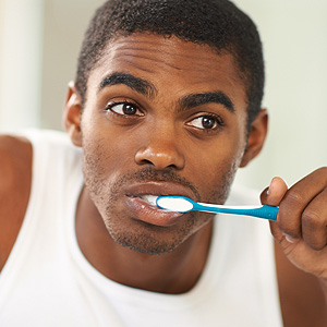 Man Brushing his Teeth