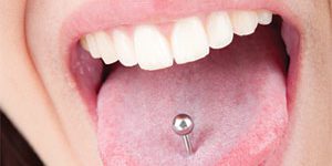 Close up shot of oral piercing